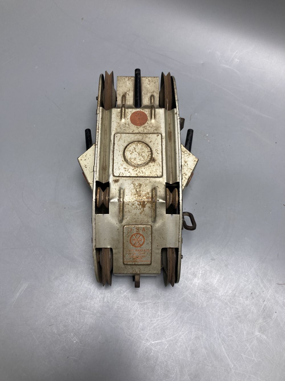 A tinplate clockwork WWI Turnover Tank, Louis Marx & Co, New York, circa 1932 (lacking trailer), L 22cm